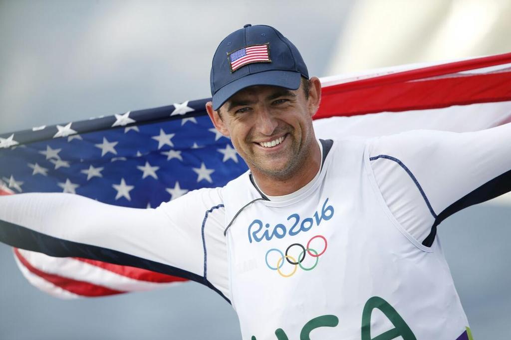 Caleb Paine celebrates bronze in the Finn class at the Rio 2016 Olympic Sailing Competition &copy; Sailing Energy/World Sailing